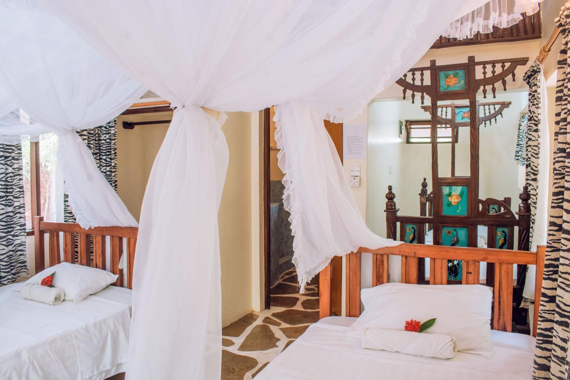 Kijani Cottages In Diani Диани-Бич Экстерьер фото