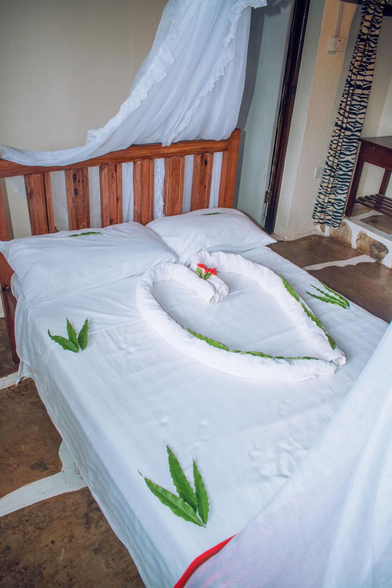 Kijani Cottages In Diani Диани-Бич Экстерьер фото