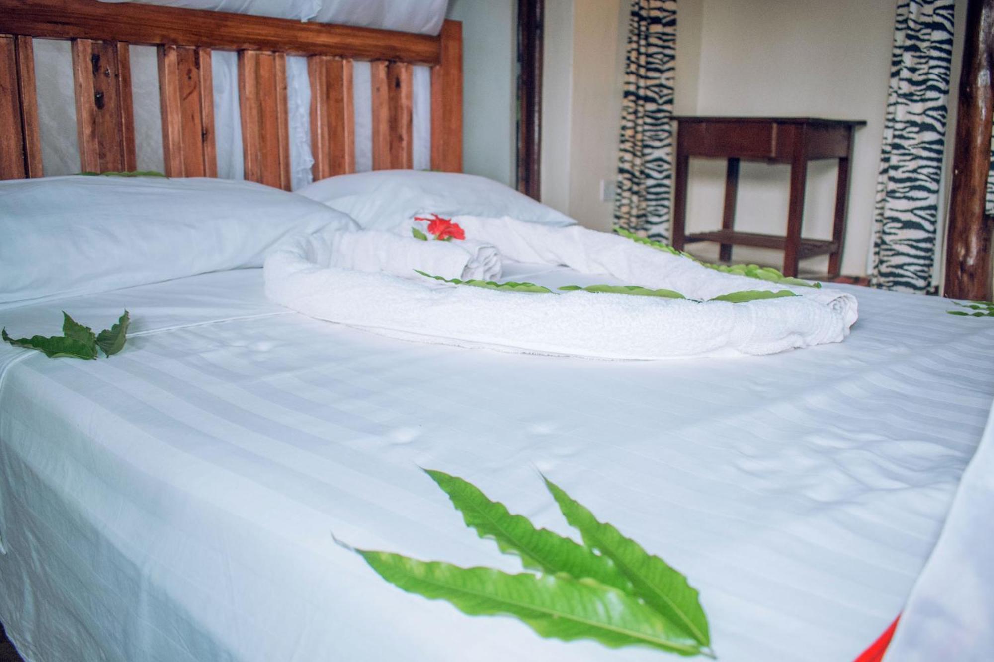 Kijani Cottages In Diani Диани-Бич Экстерьер фото